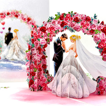 Blonde - Meridian Pink & Red Rose Arch with Bride & Groom Created by Origami Pop Cards – 3D Pop Up Greeting Cards, Australian Design & Handmade, 3D Pop Up Magical Paper Cards, Handmade Pop Up Cards Celebrate Love Anniversary Heart Fell and Romantic