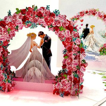 Blonde - Meridian Pink & Red Rose Arch with Bride & Groom Created by Origami Pop Cards – 3D Pop Up Greeting Cards, Australian Design & Handmade, 3D Pop Up Magical Paper Cards, Handmade Pop Up Cards Celebrate Love Anniversary Heart Fell and Romantic