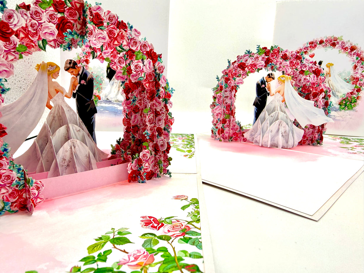 Blonde - Meridian Pink & Red Rose Arch with Bride & Groom Created by Origami Pop Cards – 3D Pop Up Greeting Cards, Australian Design & Handmade, 3D Pop Up Magical Paper Cards, Handmade Pop Up Cards Celebrate Love Anniversary Heart Fell and Romantic