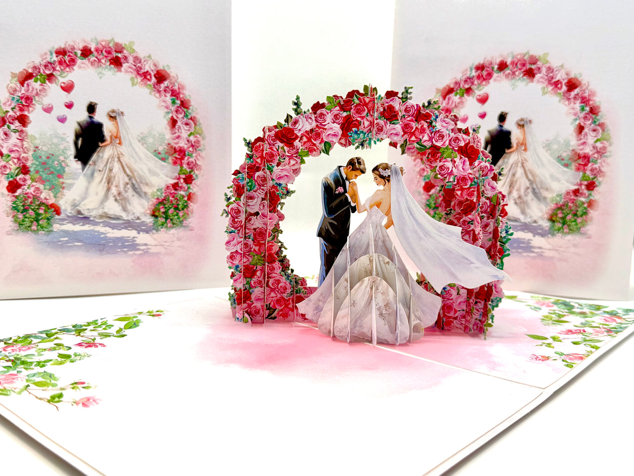 Brunette - Meridian Pink & Red Rose Arch with Bride & Groom Created by Origami Pop Cards – 3D Pop Up Greeting Cards, Australian Design & Handmade, 3D Pop Up Magical Paper Cards, Handmade Pop Up Cards Celebrate Love Anniversary Heart Fell and Romantic