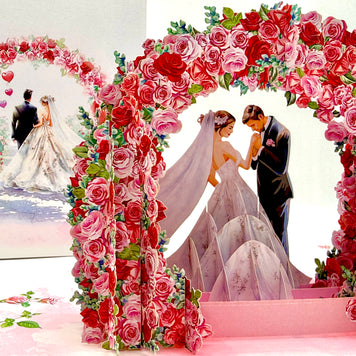 Brunette - Meridian Pink & Red Rose Arch with Bride & Groom Created by Origami Pop Cards – 3D Pop Up Greeting Cards, Australian Design & Handmade, 3D Pop Up Magical Paper Cards, Handmade Pop Up Cards Celebrate Love Anniversary Heart Fell and Romantic