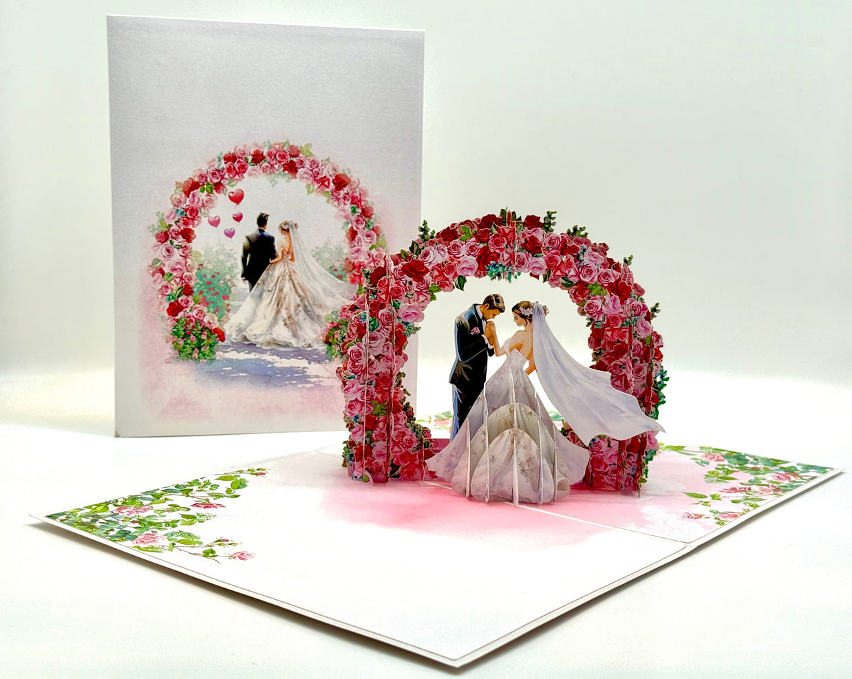 Brunette - Meridian Pink & Red Rose Arch with Bride & Groom Created by Origami Pop Cards – 3D Pop Up Greeting Cards, Australian Design & Handmade, 3D Pop Up Magical Paper Cards, Handmade Pop Up Cards Celebrate Love Anniversary Heart Fell and Romantic