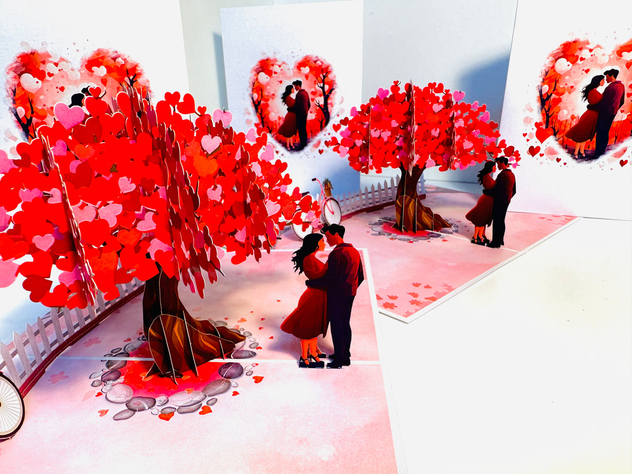 Couple in Love under a Hot Pink Love Heart Cherry Blossom Tree 3D POP UP GREETING CARD - Created by Origami Pop Cards Australian Design & Handmade 3D Pop Up Magical Paper Cards, Handmade Pop Up Cards Celebrate Love Anniversary Heart Fell and Romantic