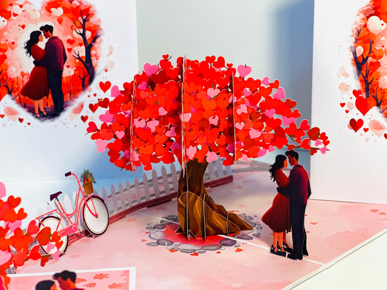 Couple in Love under a Hot Pink Love Heart Cherry Blossom Tree 3D POP UP GREETING CARD - Created by Origami Pop Cards Australian Design & Handmade 3D Pop Up Magical Paper Cards, Handmade Pop Up Cards Celebrate Love Anniversary Heart Fell and Romantic