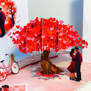Couple in Love under a Hot Pink Love Heart Cherry Blossom Tree 3D POP UP GREETING CARD - Created by Origami Pop Cards Australian Design & Handmade 3D Pop Up Magical Paper Cards, Handmade Pop Up Cards Celebrate Love Anniversary Heart Fell and Romantic