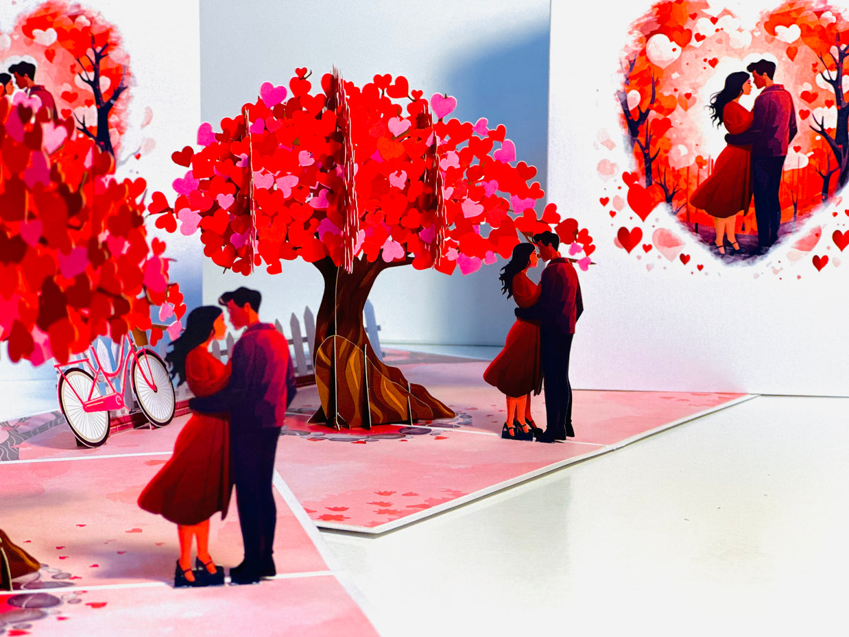 Couple in Love under a Hot Pink Love Heart Cherry Blossom Tree 3D POP UP GREETING CARD - Created by Origami Pop Cards Australian Design & Handmade 3D Pop Up Magical Paper Cards, Handmade Pop Up Cards Celebrate Love Anniversary Heart Fell and Romantic