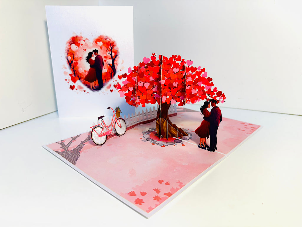 Couple in Love under a Hot Pink Love Heart Cherry Blossom Tree 3D POP UP GREETING CARD - Created by Origami Pop Cards Australian Design & Handmade 3D Pop Up Magical Paper Cards, Handmade Pop Up Cards Celebrate Love Anniversary Heart Fell and Romantic