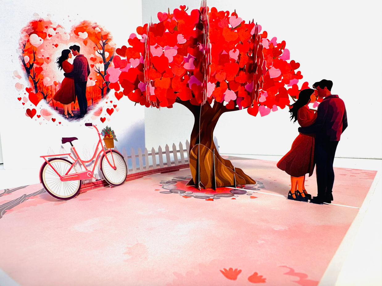 Couple in Love under a Hot Pink Love Heart Cherry Blossom Tree 3D POP UP GREETING CARD - Created by Origami Pop Cards Australian Design & Handmade 3D Pop Up Magical Paper Cards, Handmade Pop Up Cards Celebrate Love Anniversary Heart Fell and Romantic