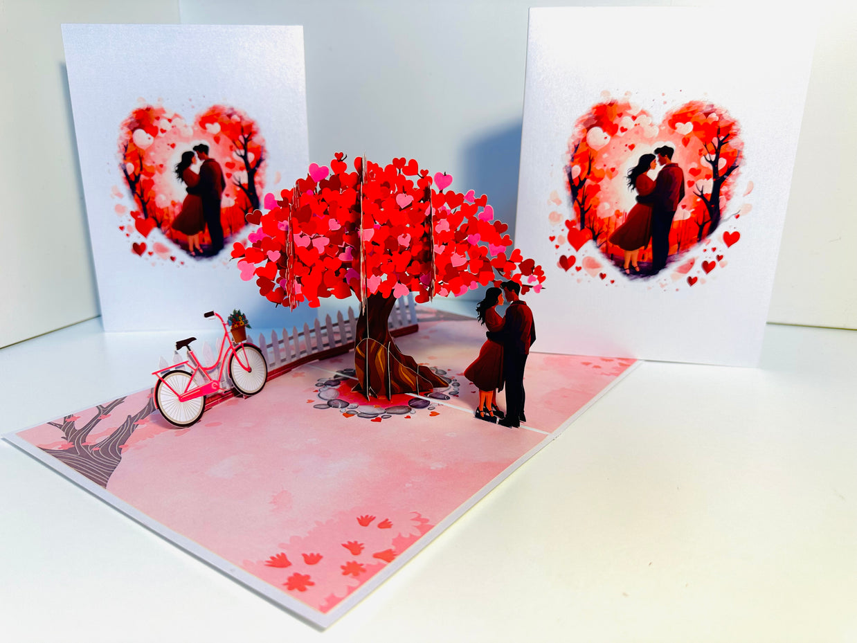 Couple in Love under a Hot Pink Love Heart Cherry Blossom Tree 3D POP UP GREETING CARD - Created by Origami Pop Cards Australian Design & Handmade 3D Pop Up Magical Paper Cards, Handmade Pop Up Cards Celebrate Love Anniversary Heart Fell and Romantic