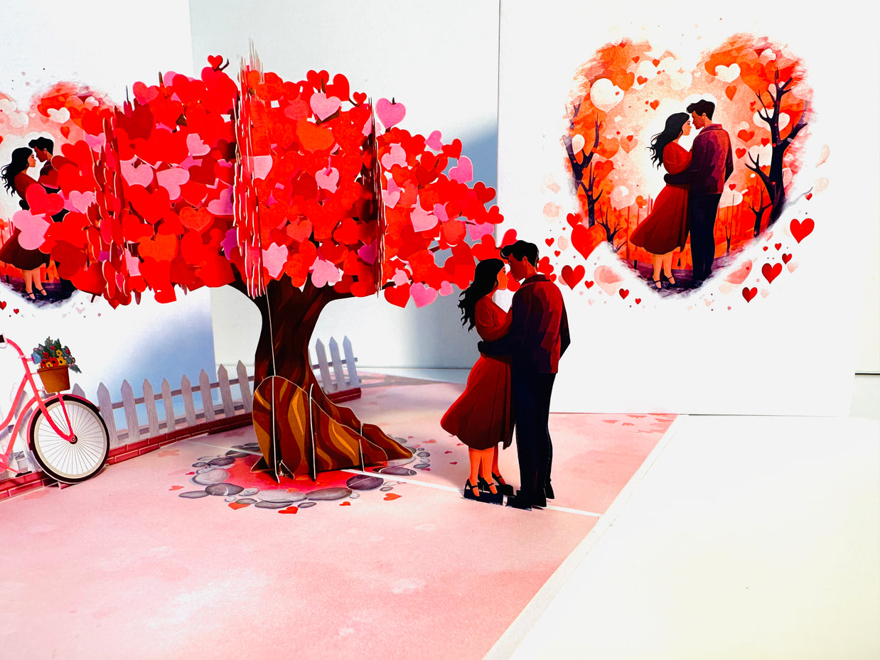 Couple in Love under a Hot Pink Love Heart Cherry Blossom Tree 3D POP UP GREETING CARD - Created by Origami Pop Cards Australian Design & Handmade 3D Pop Up Magical Paper Cards, Handmade Pop Up Cards Celebrate Love Anniversary Heart Fell and Romantic