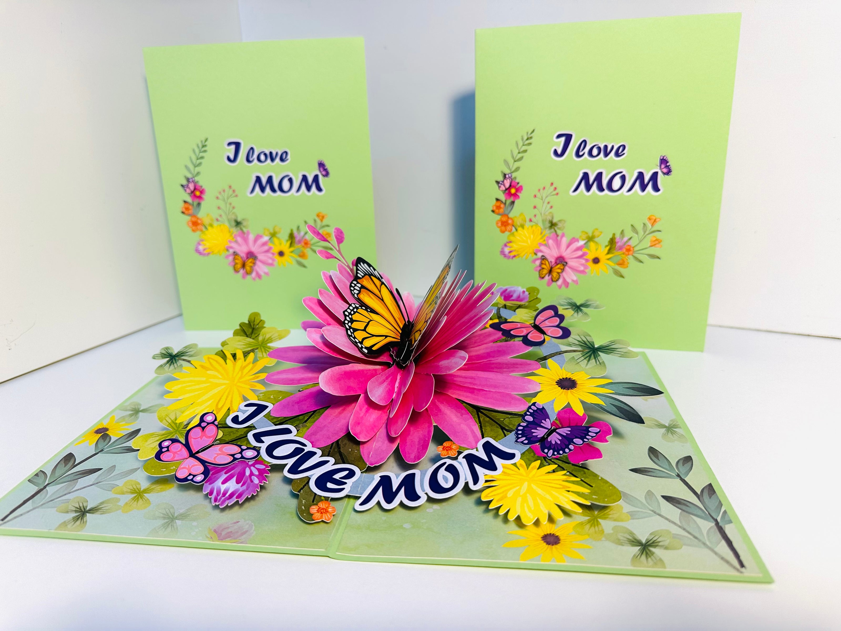 I LOVE MOM - Green Daisy Butterfly Spring Garden Origami Pop Cards 3D Pop Up Greeting Card Handmade Gift for Mum Floral Blank Card Australian Made Thank You Thinking of You Mother's Day Paper Art Gift Australian Flowers Celebrate Special Mum
