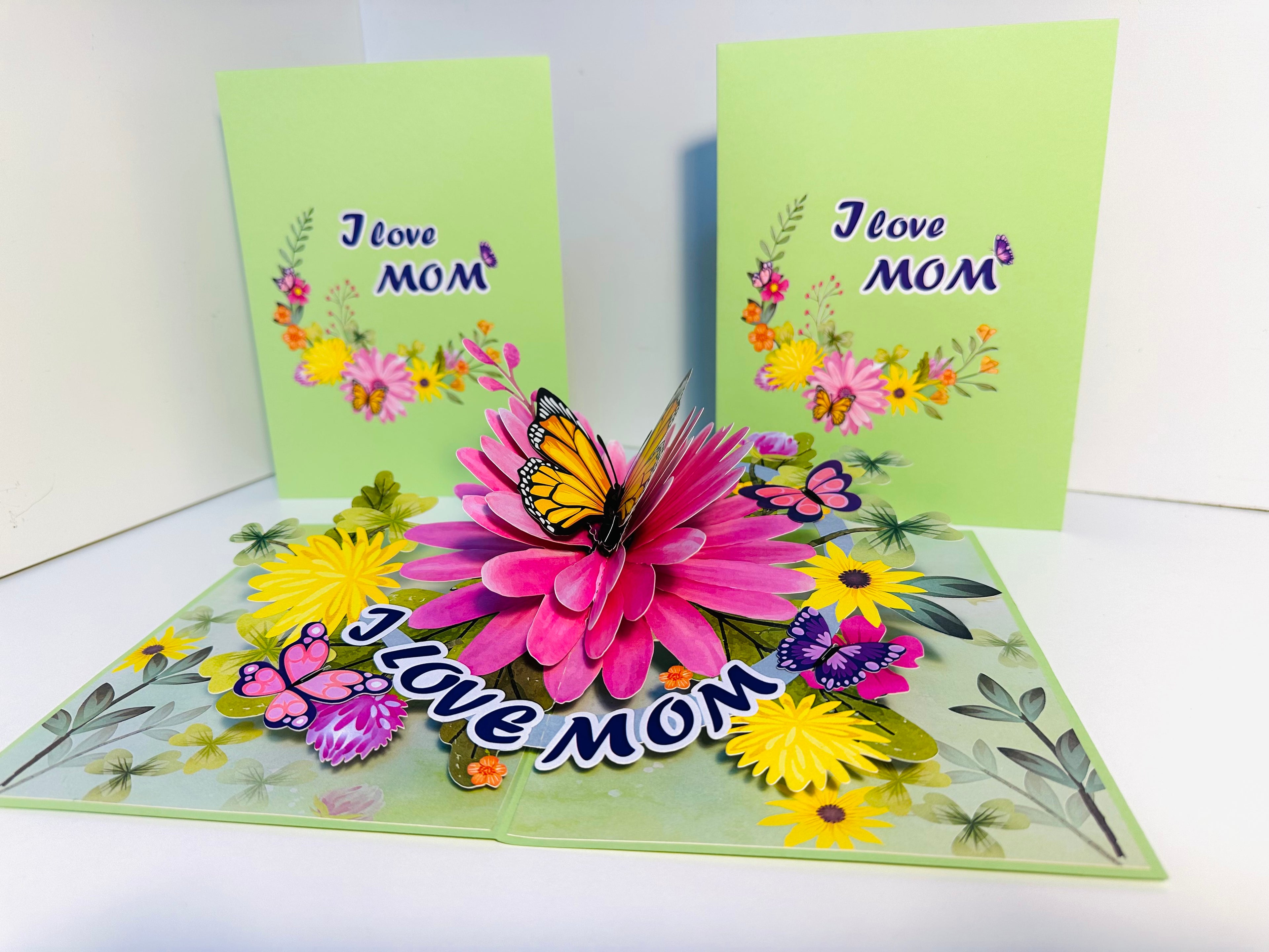 I LOVE MOM - Green Daisy Butterfly Spring Garden Origami Pop Cards 3D Pop Up Greeting Card Handmade Gift for Mum Floral Blank Card Australian Made Thank You Thinking of You Mother's Day Paper Art Gift Australian Flowers Celebrate Special Mum