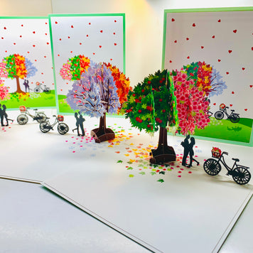 LUXURY Silhouette Couple Kissing Under a Four Seasons Tree 3D POP UP GREETING CARD - Created by Origami Pop Cards Australian Design & Handmade 3D Pop Up Magical Paper Cards, Handmade Pop Cards Happy Valentine's Day Celebrate Love Heart Fell Romantic