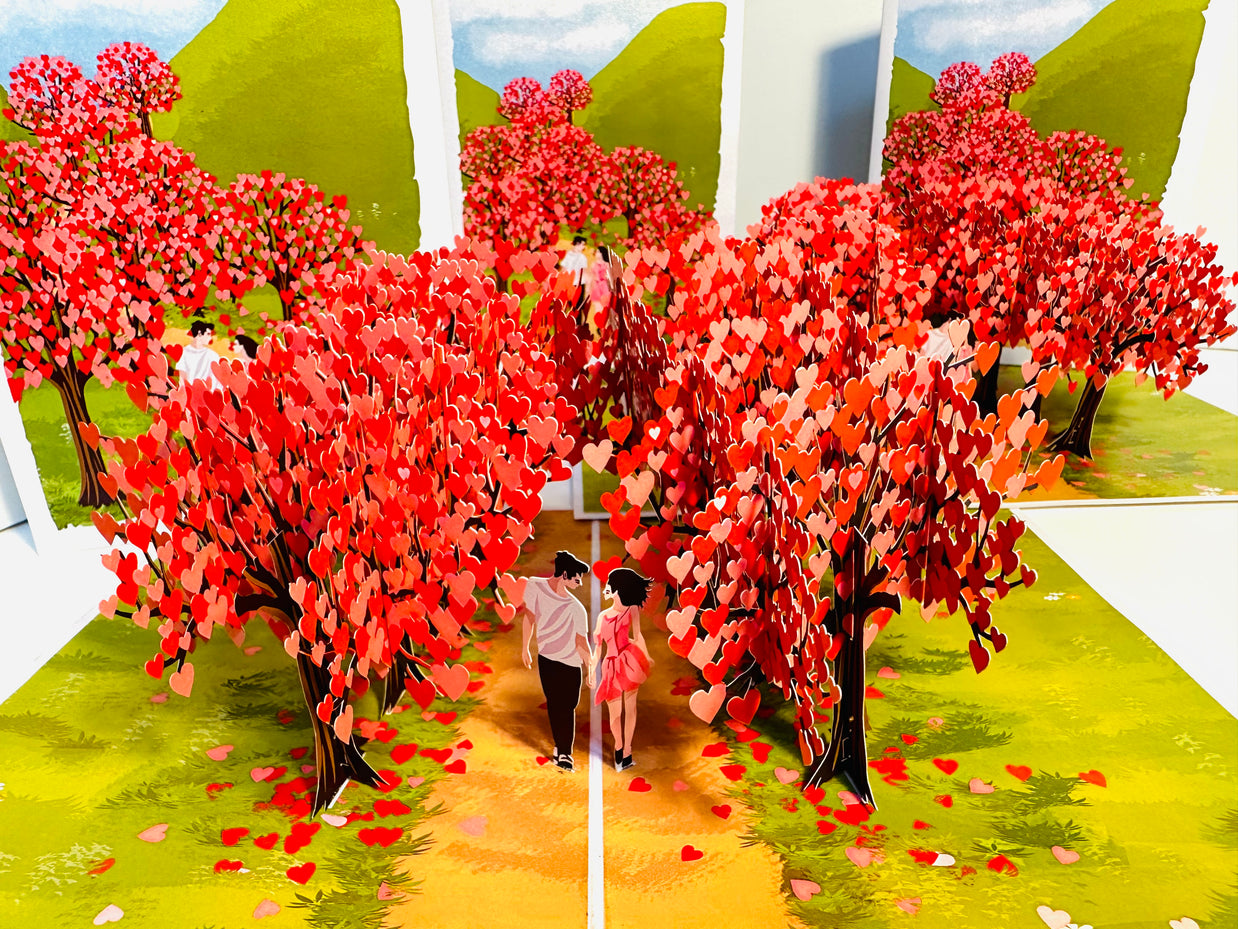 Love Heart Cherry Blossom Forest with a Couple in Love 3D POP UP GREETING CARD - Created by Origami Pop Cards Australian Design & Handmade 3D Pop Up Magical Paper Cards, Handmade Pop Up Cards Happy Valentine's Day Celebrate Love Heart Fell and Romantic