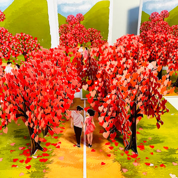 Love Heart Cherry Blossom Forest with a Couple in Love 3D POP UP GREETING CARD - Created by Origami Pop Cards Australian Design & Handmade 3D Pop Up Magical Paper Cards, Handmade Pop Up Cards Happy Valentine's Day Celebrate Love Heart Fell and Romantic