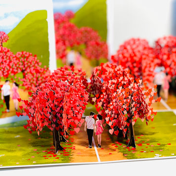 Love Heart Cherry Blossom Forest with a Couple in Love 3D POP UP GREETING CARD - Created by Origami Pop Cards Australian Design & Handmade 3D Pop Up Magical Paper Cards, Handmade Pop Up Cards Happy Valentine's Day Celebrate Love Heart Fell and Romantic