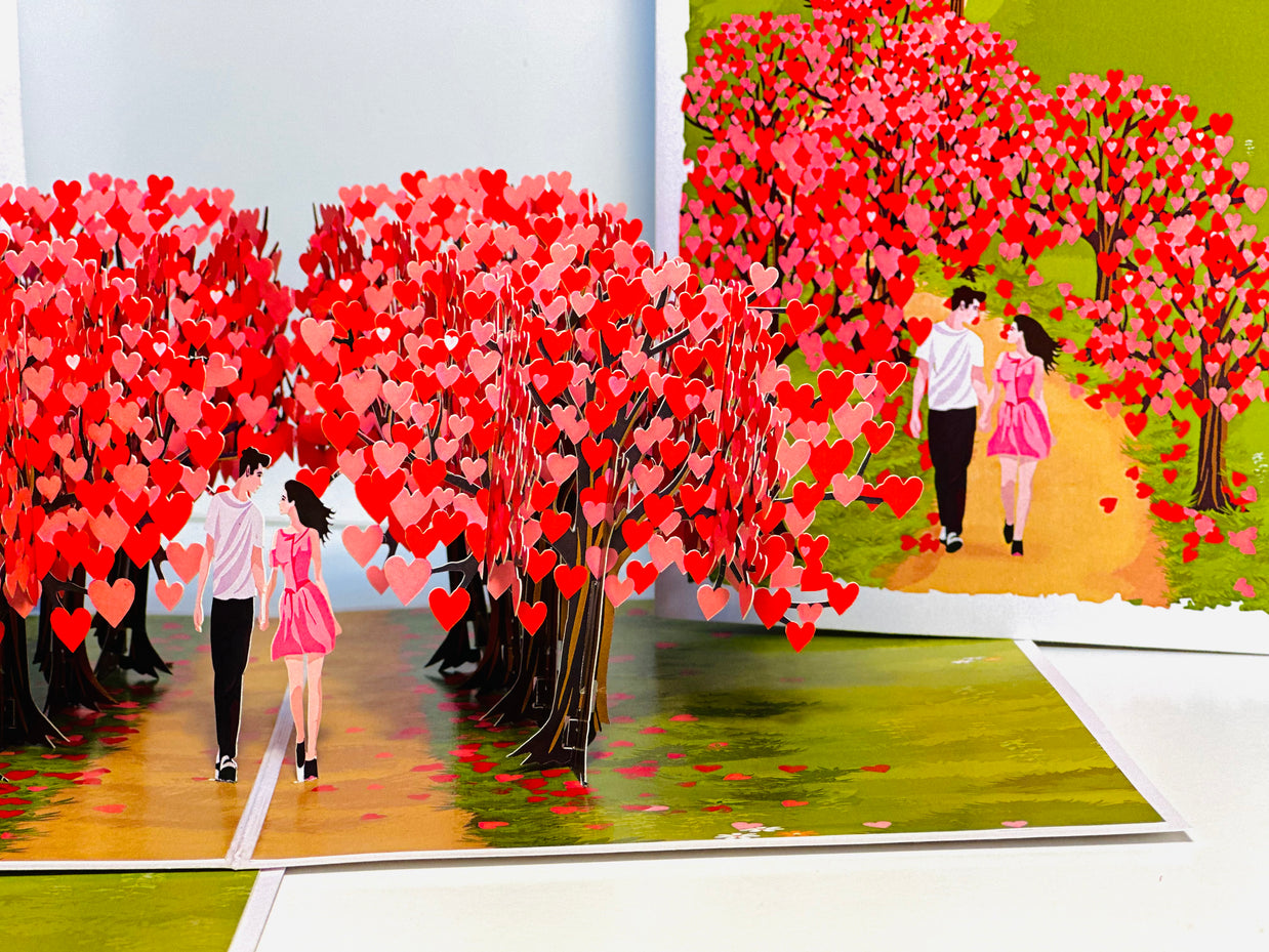 Love Heart Cherry Blossom Forest with a Couple in Love 3D POP UP GREETING CARD - Created by Origami Pop Cards Australian Design & Handmade 3D Pop Up Magical Paper Cards, Handmade Pop Up Cards Happy Valentine's Day Celebrate Love Heart Fell and Romantic
