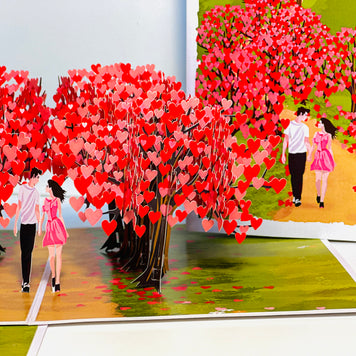 Love Heart Cherry Blossom Forest with a Couple in Love 3D POP UP GREETING CARD - Created by Origami Pop Cards Australian Design & Handmade 3D Pop Up Magical Paper Cards, Handmade Pop Up Cards Happy Valentine's Day Celebrate Love Heart Fell and Romantic