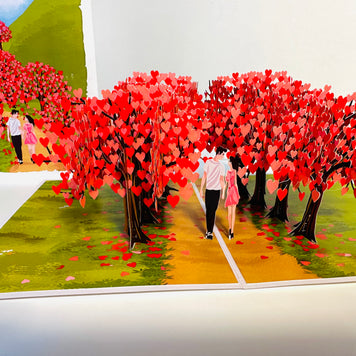 Love Heart Cherry Blossom Forest with a Couple in Love 3D POP UP GREETING CARD - Created by Origami Pop Cards Australian Design & Handmade 3D Pop Up Magical Paper Cards, Handmade Pop Up Cards Happy Valentine's Day Celebrate Love Heart Fell and Romantic