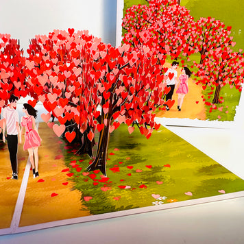 Love Heart Cherry Blossom Forest with a Couple in Love 3D POP UP GREETING CARD - Created by Origami Pop Cards Australian Design & Handmade 3D Pop Up Magical Paper Cards, Handmade Pop Up Cards Happy Valentine's Day Celebrate Love Heart Fell and Romantic