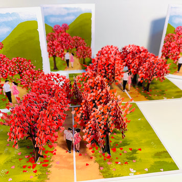 Love Heart Cherry Blossom Forest with a Couple in Love 3D POP UP GREETING CARD - Created by Origami Pop Cards Australian Design & Handmade 3D Pop Up Magical Paper Cards, Handmade Pop Up Cards Happy Valentine's Day Celebrate Love Heart Fell and Romantic