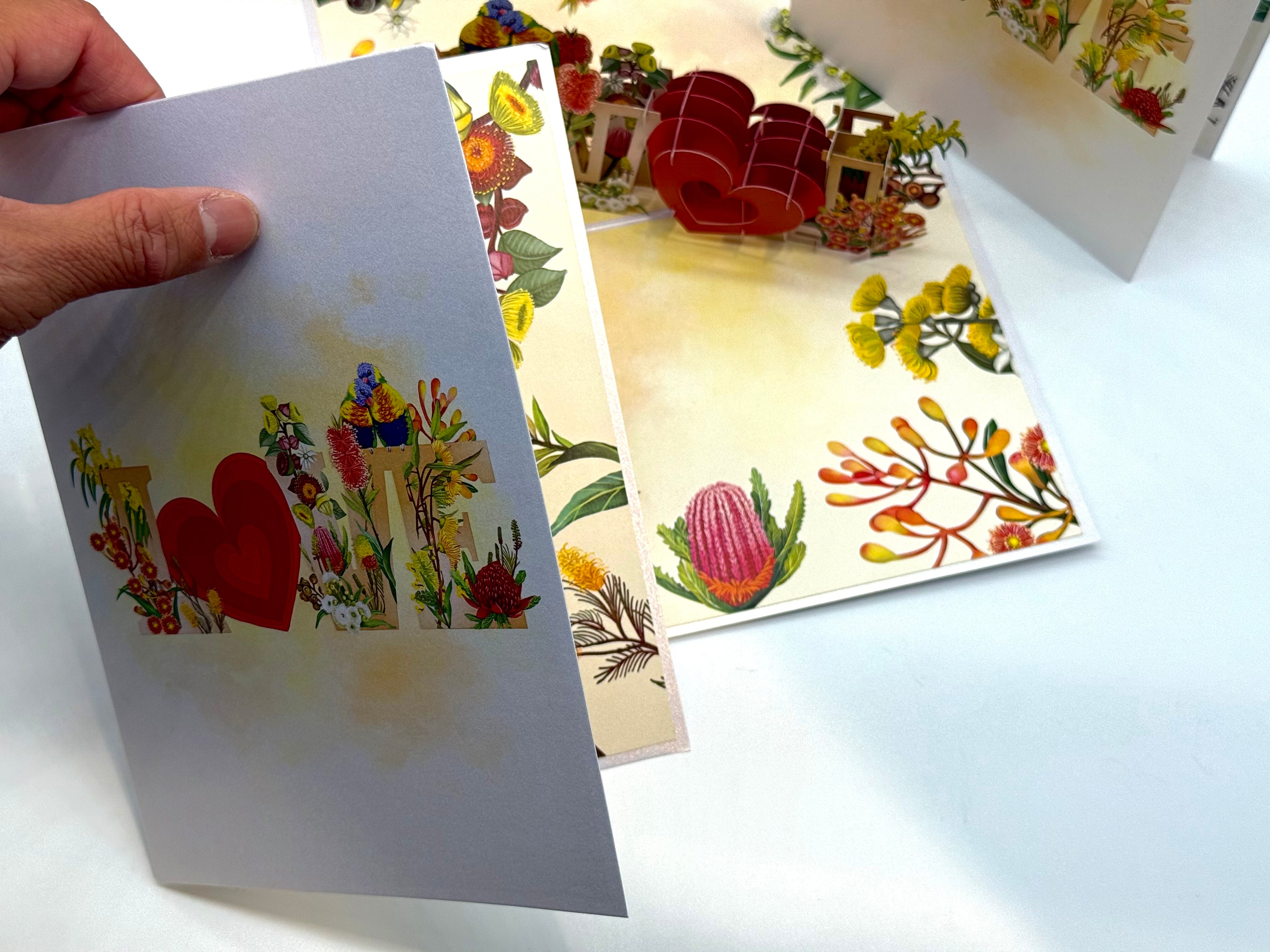 Rainbow Lorikeet LOVE Birds with Australian Native Flowers 3D POP UP GREETING CARD - Created by Origami Pop Cards Australian Design & Handmade 3D Pop Up Magical Paper Cards, Handmade Pop Up Cards Celebrate Love Anniversary Heart Fell and Romantic