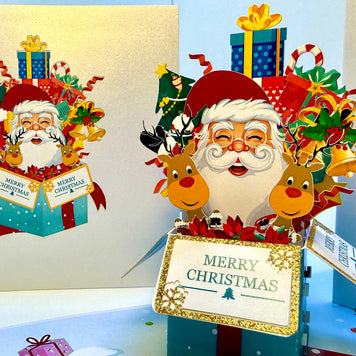🎄Santa Claus & Reindeer in a Magical Christmas Gift Box – Size 15x15cm Origami Pop Cards 3D Pop Up Greeting Card Merry Christmas Thank You Handmade Best Wishes Blank Card Gift Happy Holidays Celebrate the Special Day